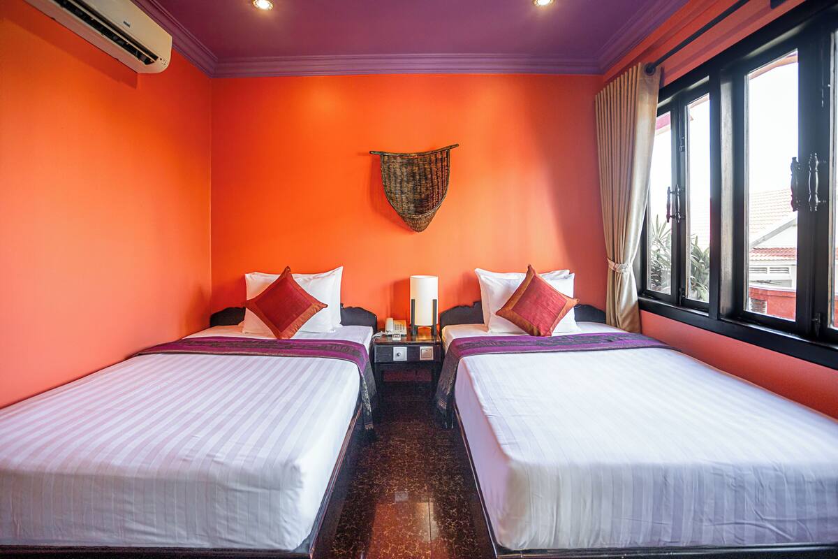Twin Room with Balcony | Minibar, in-room safe, desk, iron/ironing board (on request)