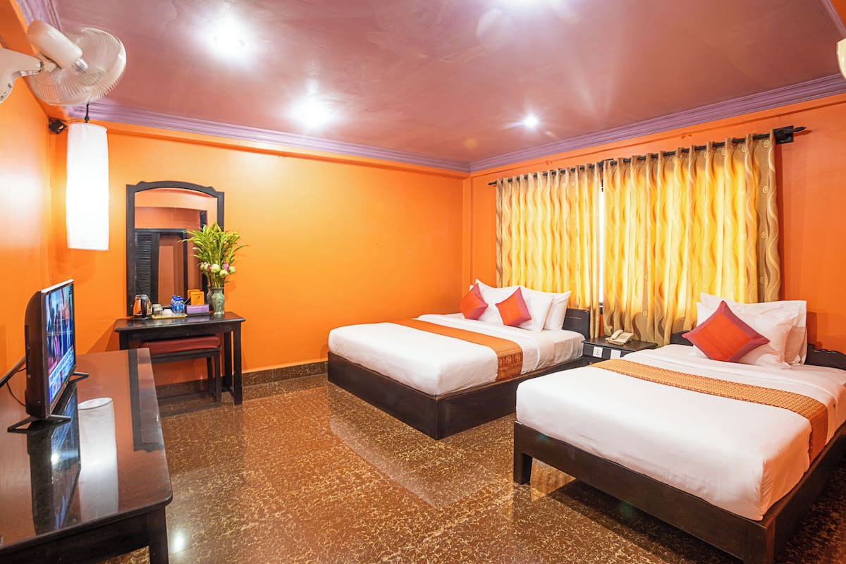 Family Room | Minibar, in-room safe, desk, iron/ironing board (on request)