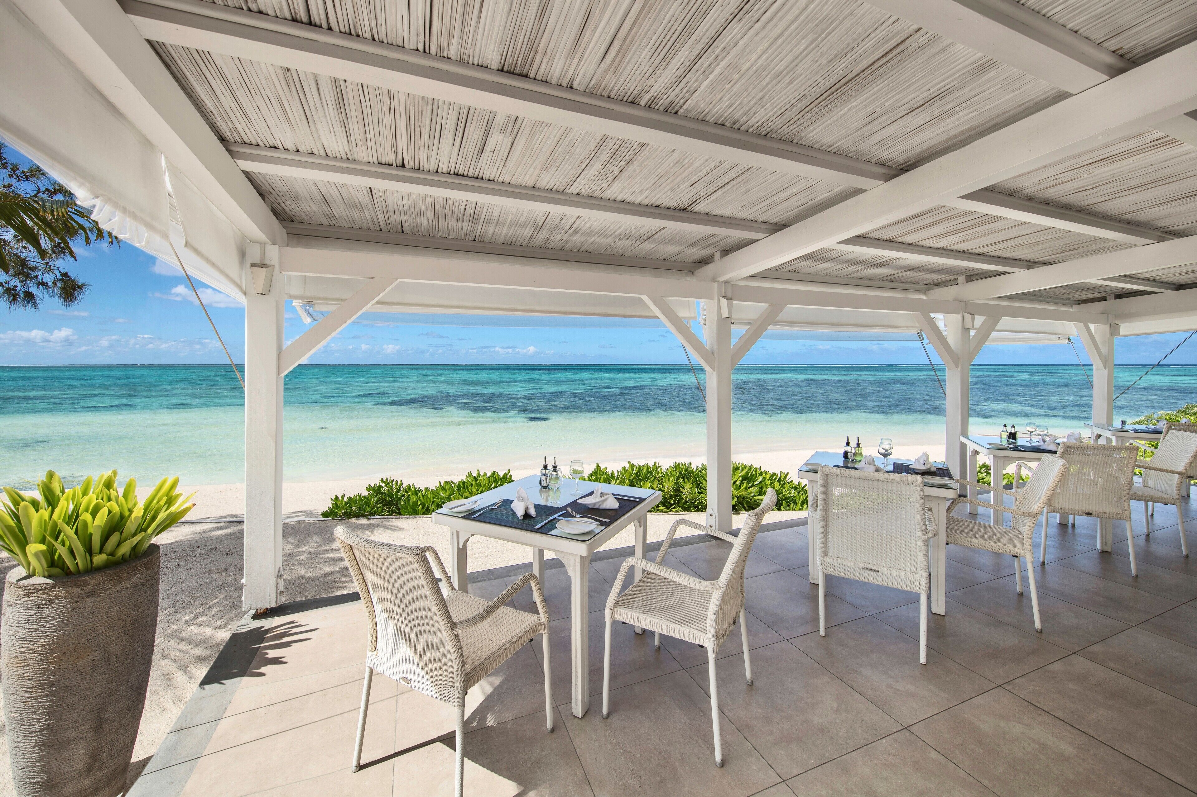 Breakfast, lunch, dinner served; international cuisine, beach views 