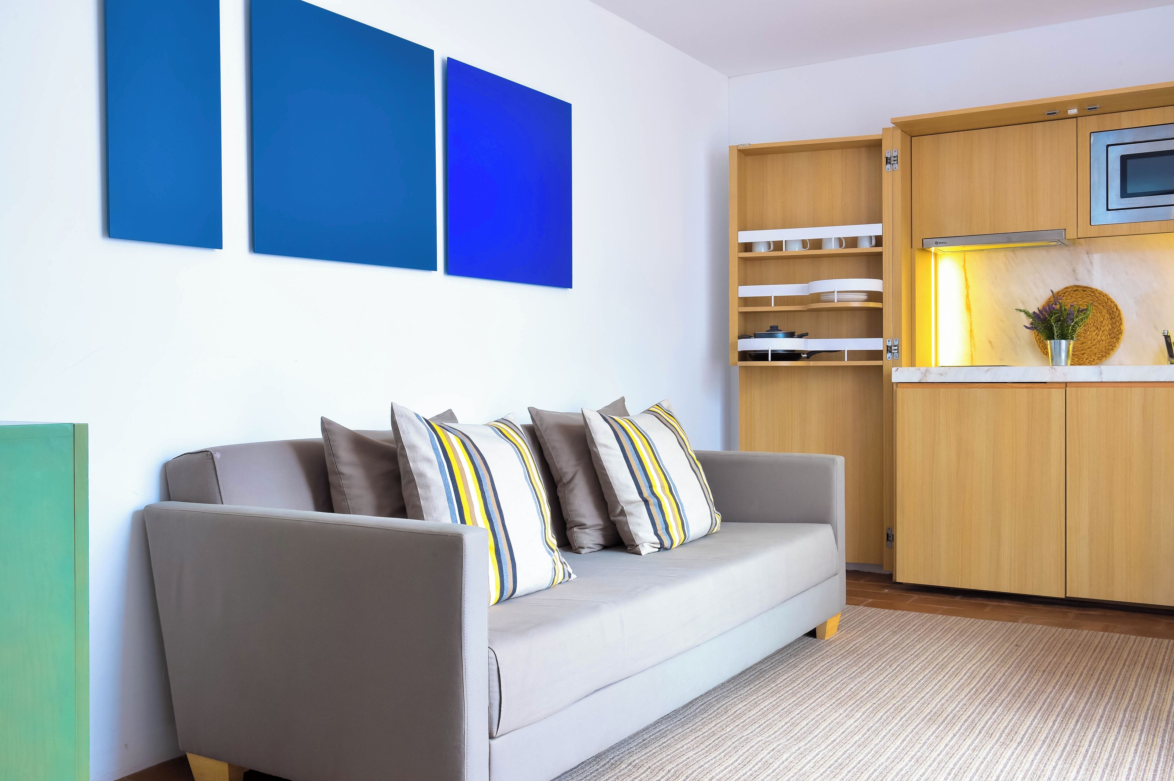 family suite (3 adults) | living area | lcd tv