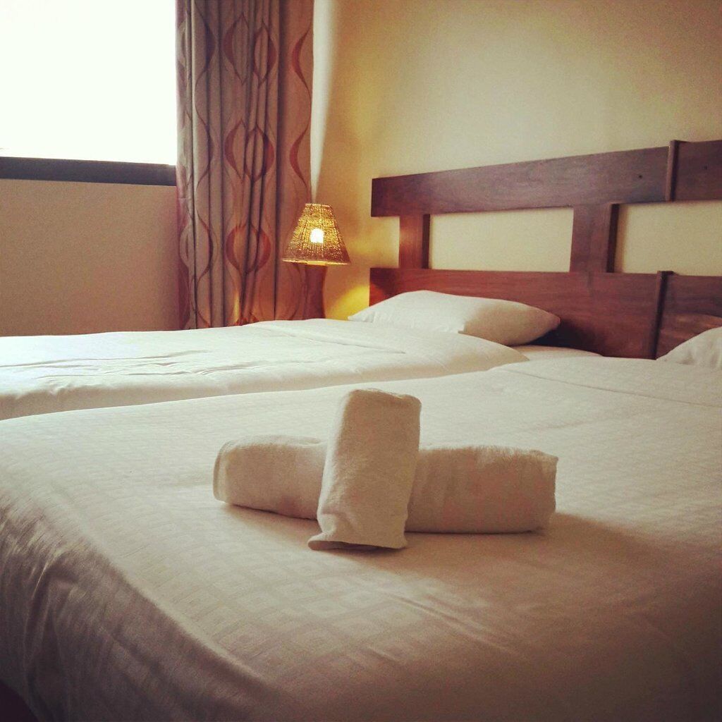 Ropa de cama de alta calidad y minibar 