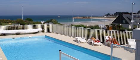 Outdoor pool, pool umbrellas, pool loungers