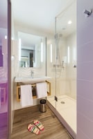 Shower, eco-friendly toiletries, hair dryer, towels