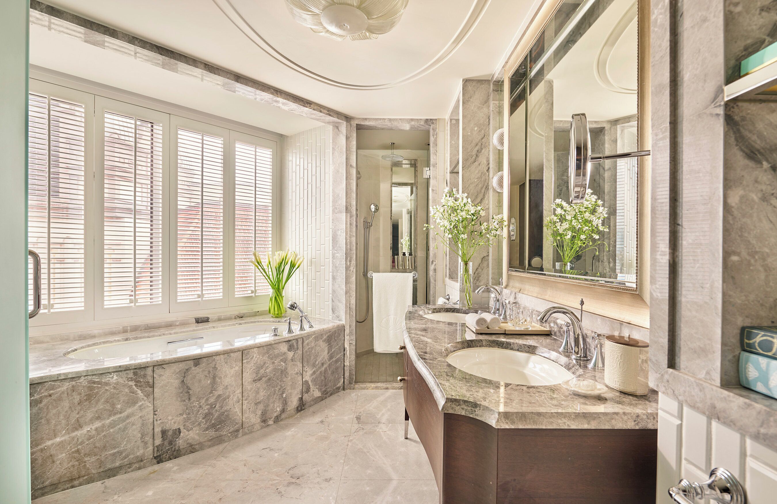 Separate tub and shower, deep soaking tub, designer toiletries