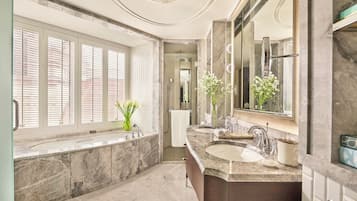 Separate tub and shower, deep soaking tub, designer toiletries