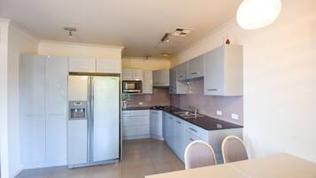 Apartment | Private kitchen | Fridge, microwave, coffee/tea maker