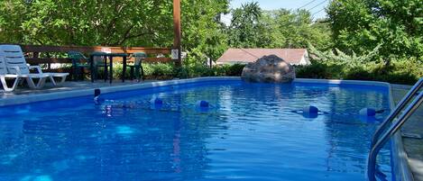 Indoor pool, outdoor pool, open 9 AM to 10 PM, pool loungers