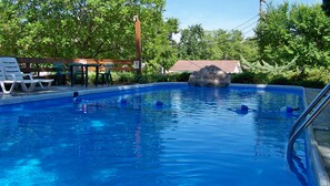 Indoor pool, outdoor pool, open 9 AM to 10 PM, sun loungers