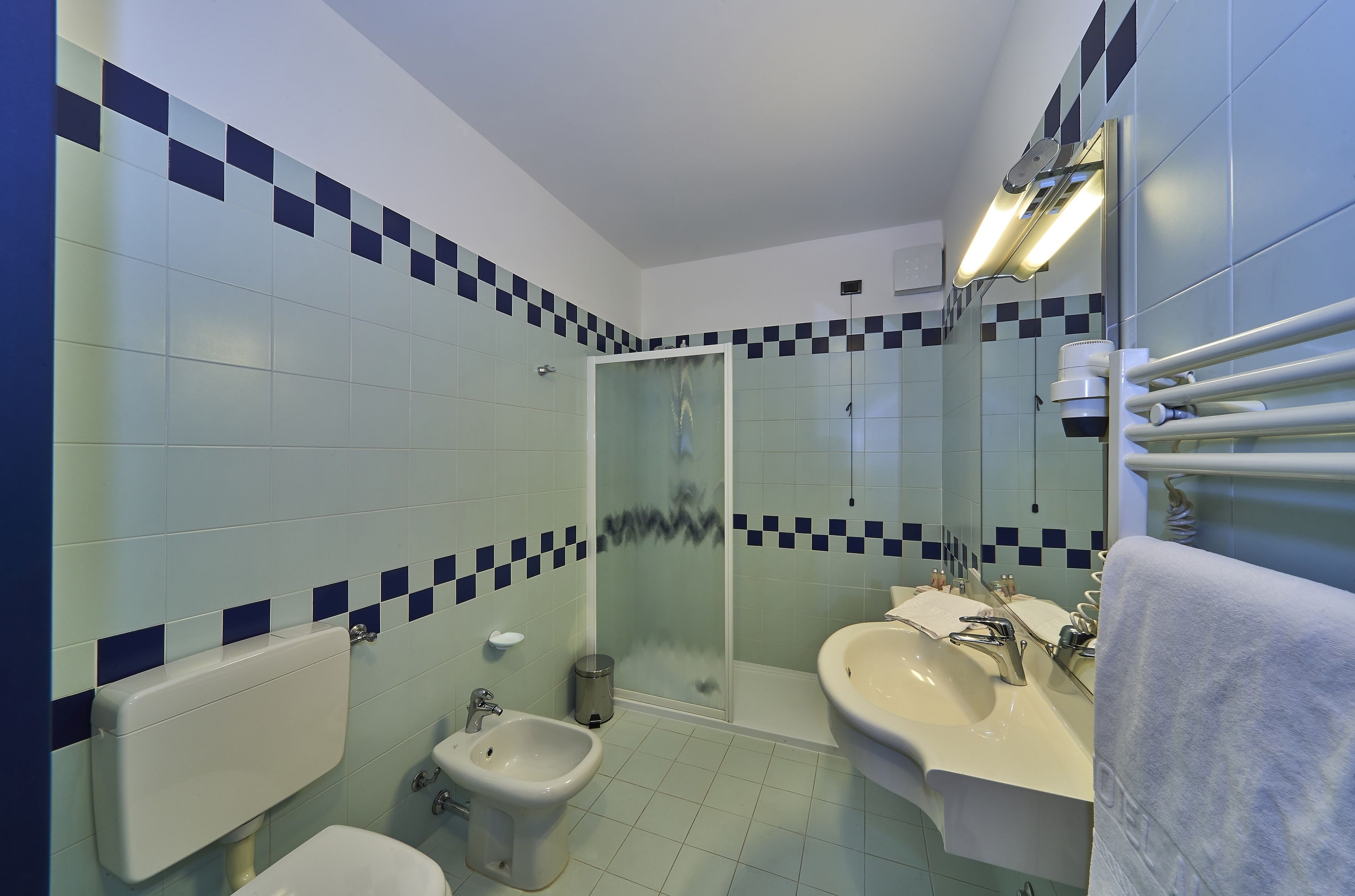 superior double room | bathroom | hair dryer, bidet, towels