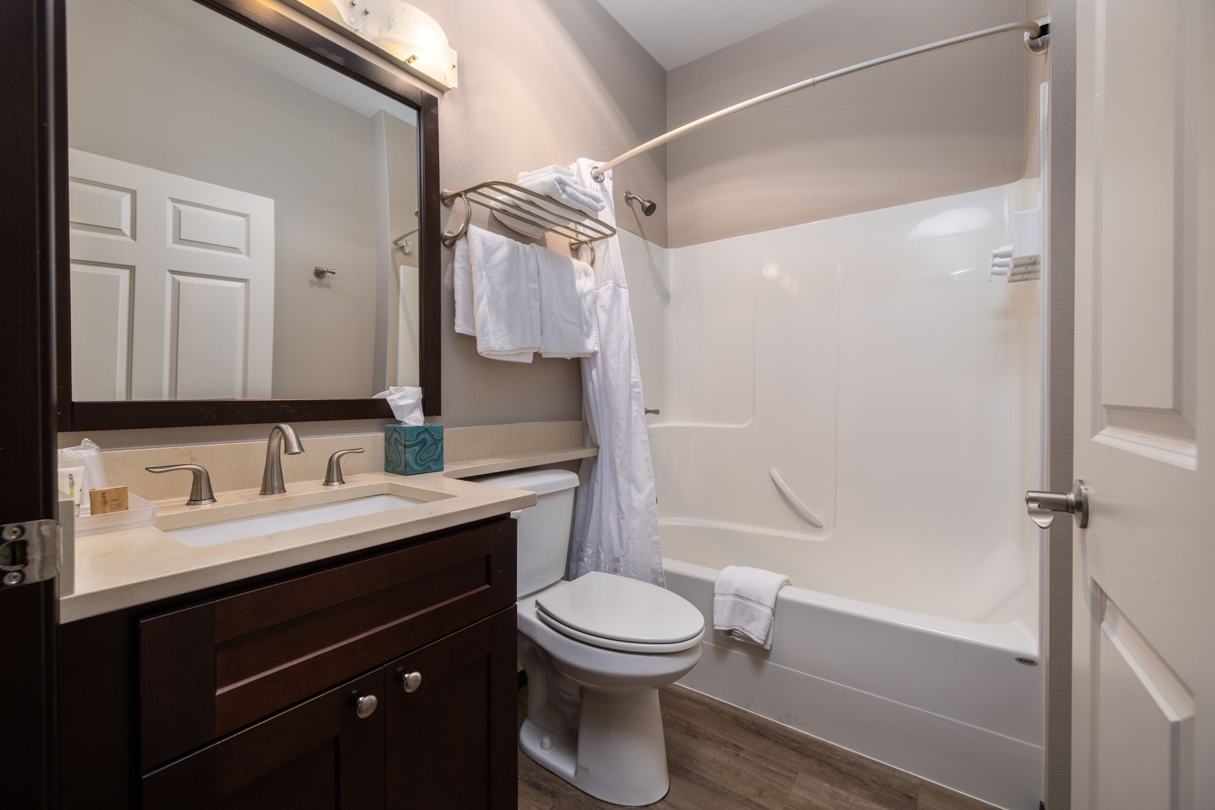 suite, 1 king bed with sofa bed | bathroom | hair dryer, towels, soap, shampoo