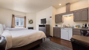 Suite, 2 Queen Beds | Private kitchen | Microwave, coffee/tea maker, eco-friendly cleaning products