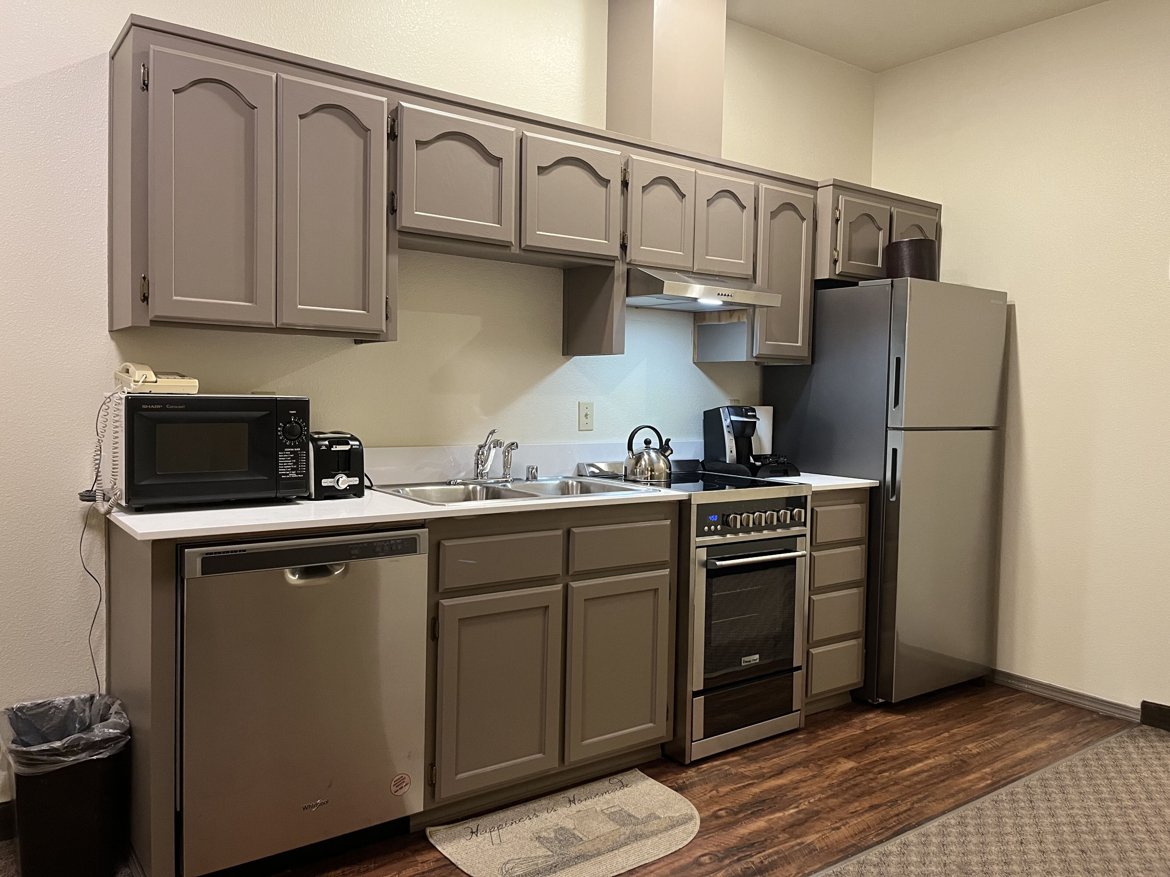 suite, 1 king bed with sofa bed | private kitchen | microwave, coffee/tea maker, eco-friendly cleaning products