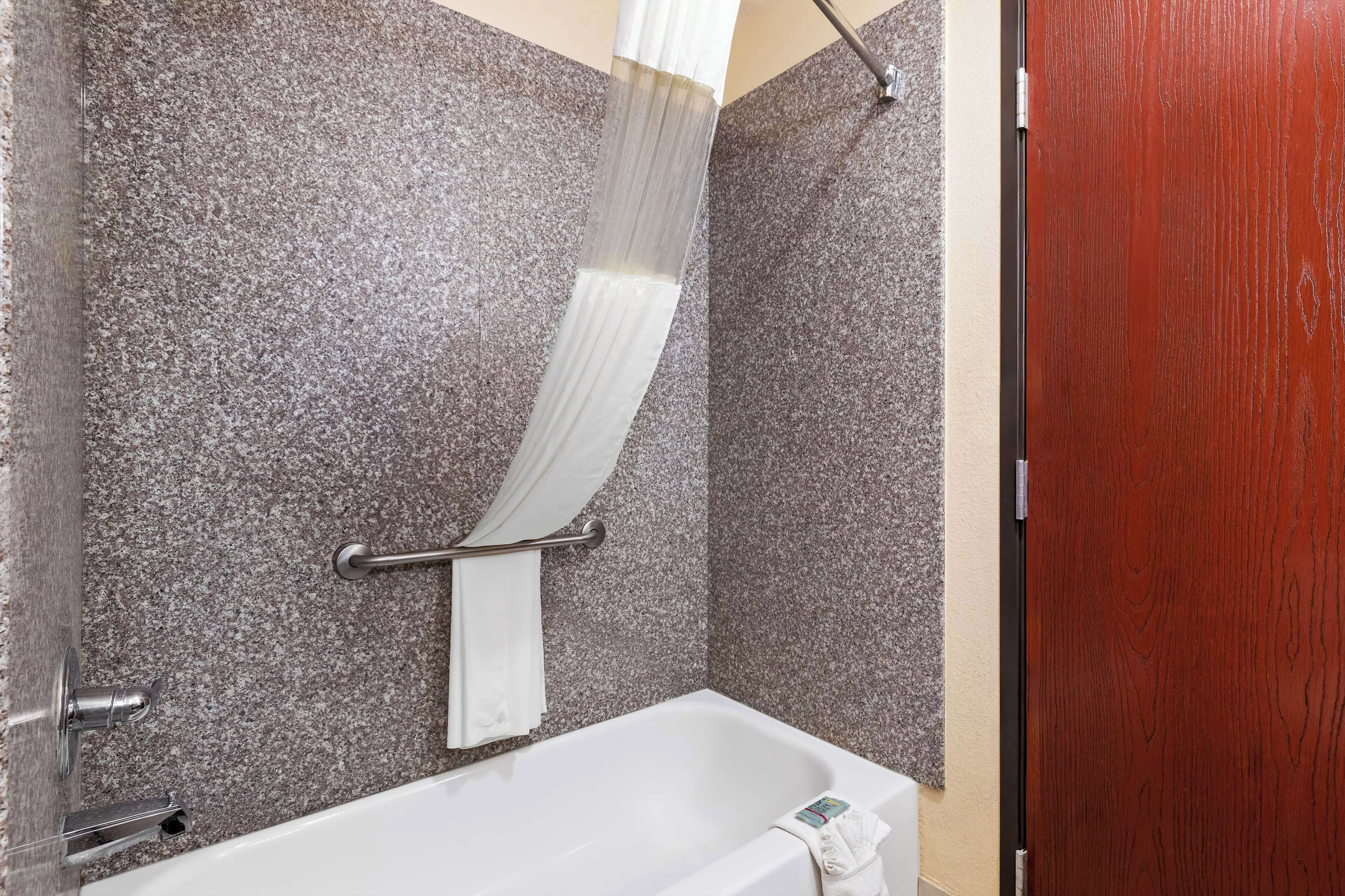 standard room, 2 queen beds, non smoking, refrigerator & microwave | bathroom | combined shower/bathtub, hair dryer, towels