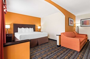 Suite, 1 King Bed, Non Smoking, Jetted Tub | Individually furnished, iron/ironing board, free WiFi, bed sheets