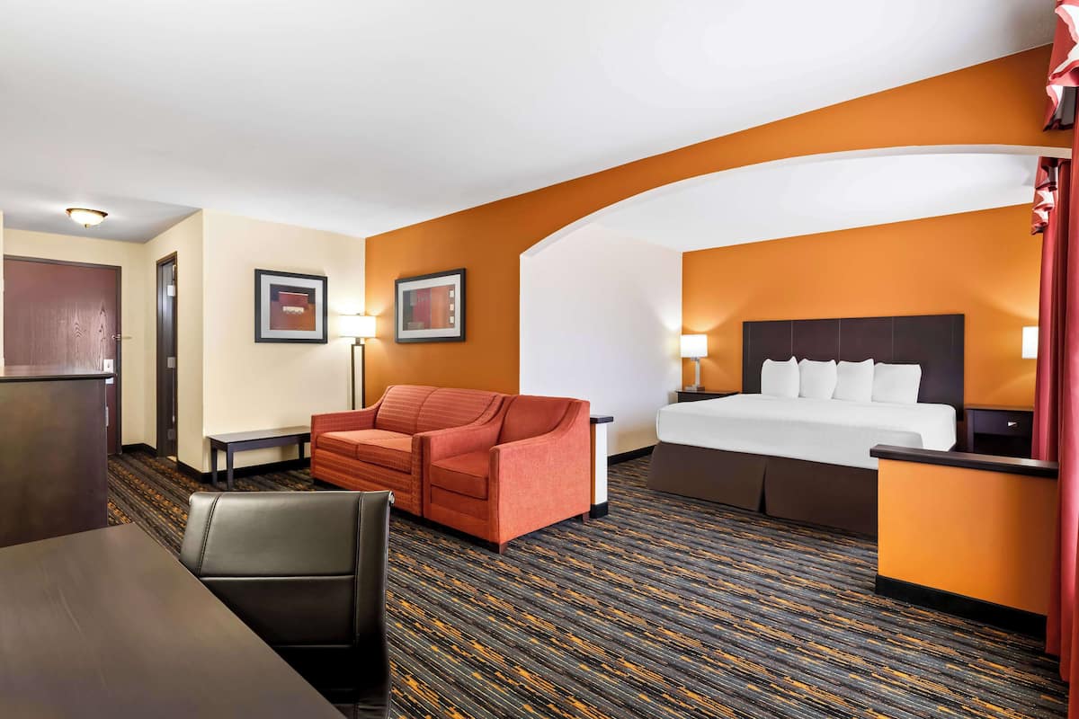 suite, 1 king bed with sofa bed, non smoking, refrigerator & microwave (with sofabed) | individually furnished, iron/ironing board, free wifi, bed sheets