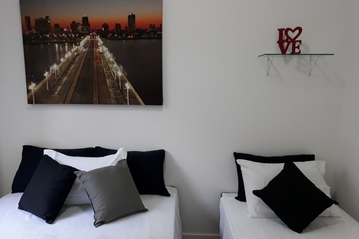 Family Condo, 1 Bedroom, Kitchen, City View | 1 bedroom, minibar, individually decorated, free WiFi