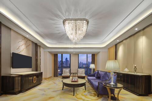 Executive Suite | Living area | 42-inch LCD TV with cable channels, TV