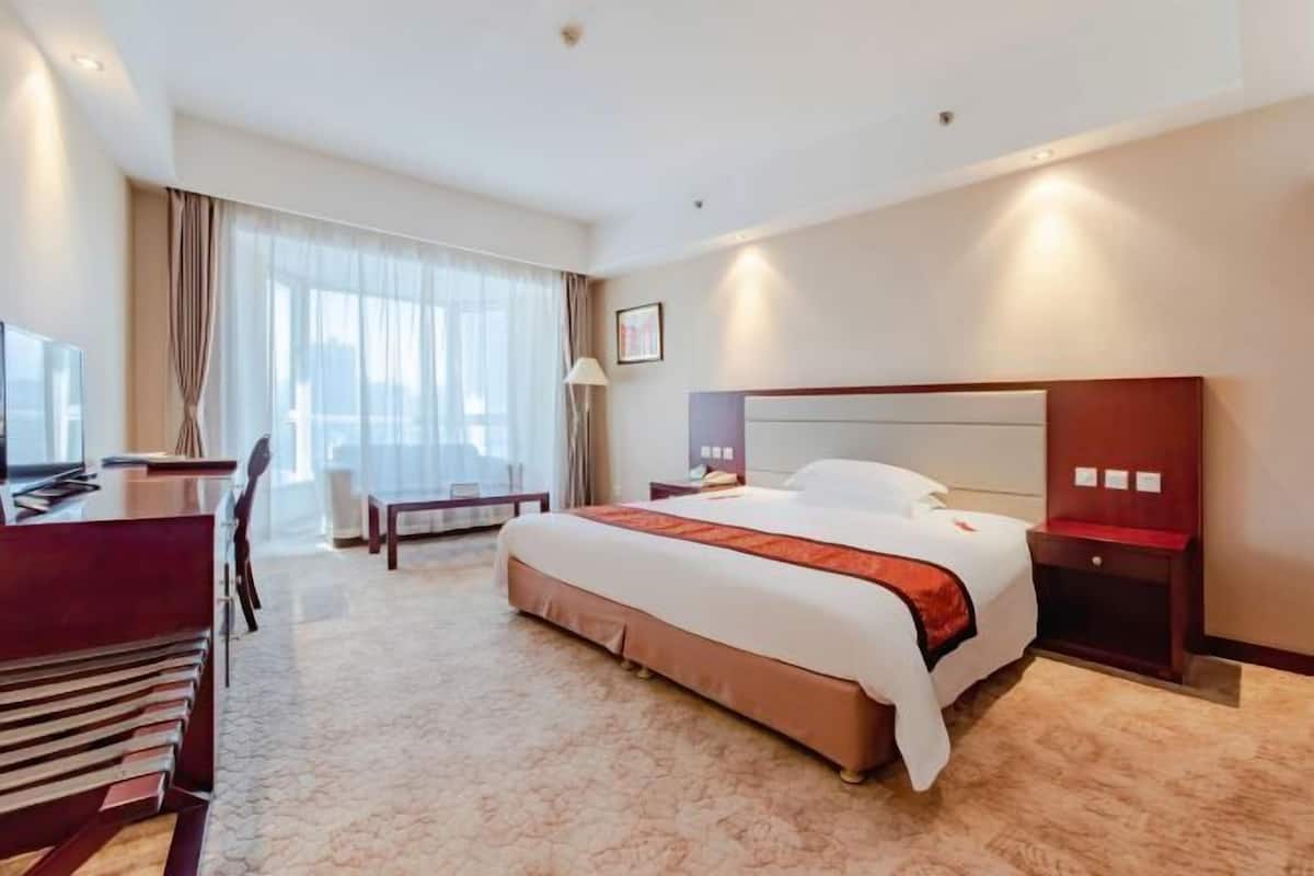 Minibar, desk, blackout curtains, iron/ironing board
