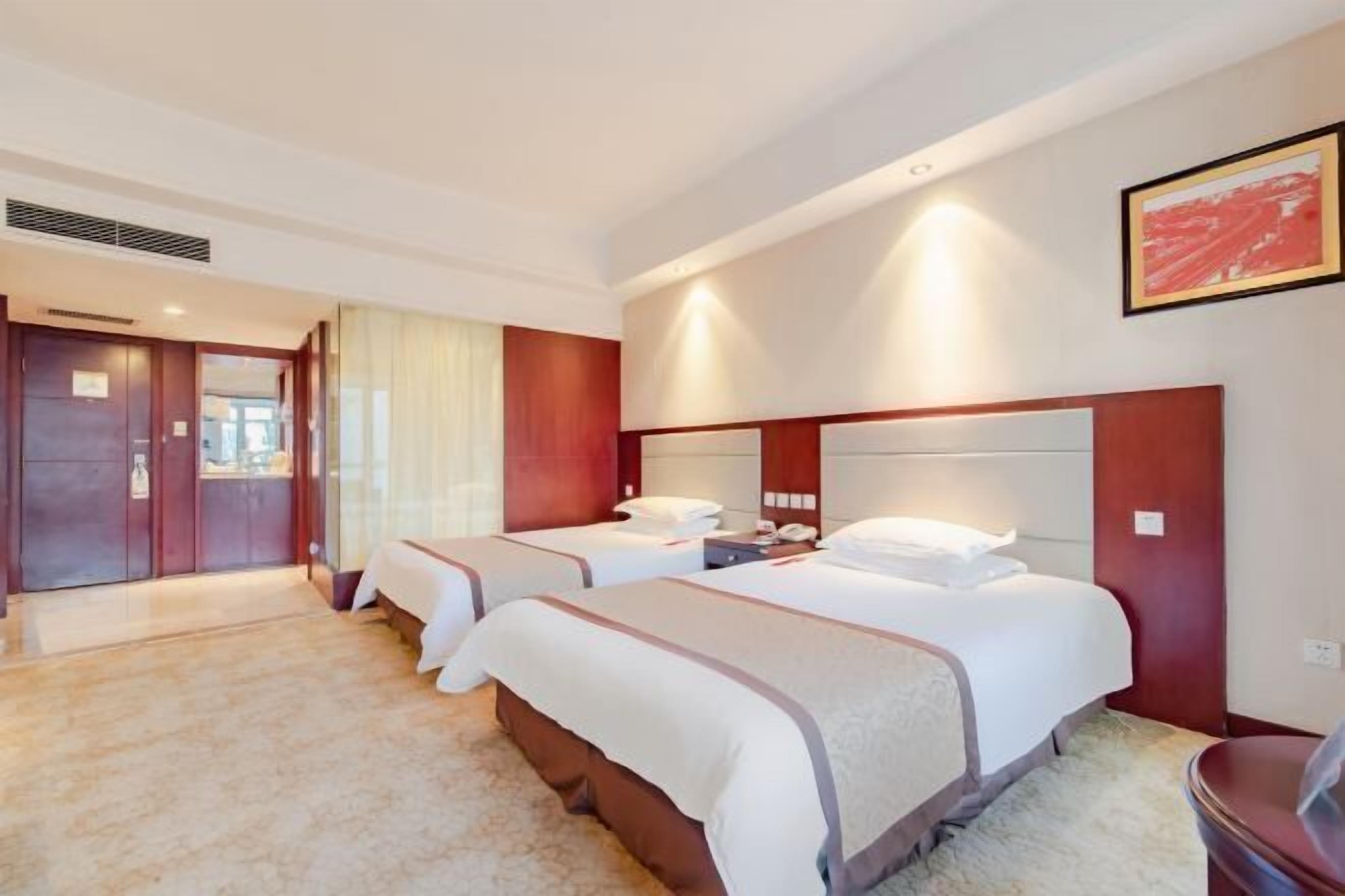 Minibar, desk, blackout curtains, iron/ironing board