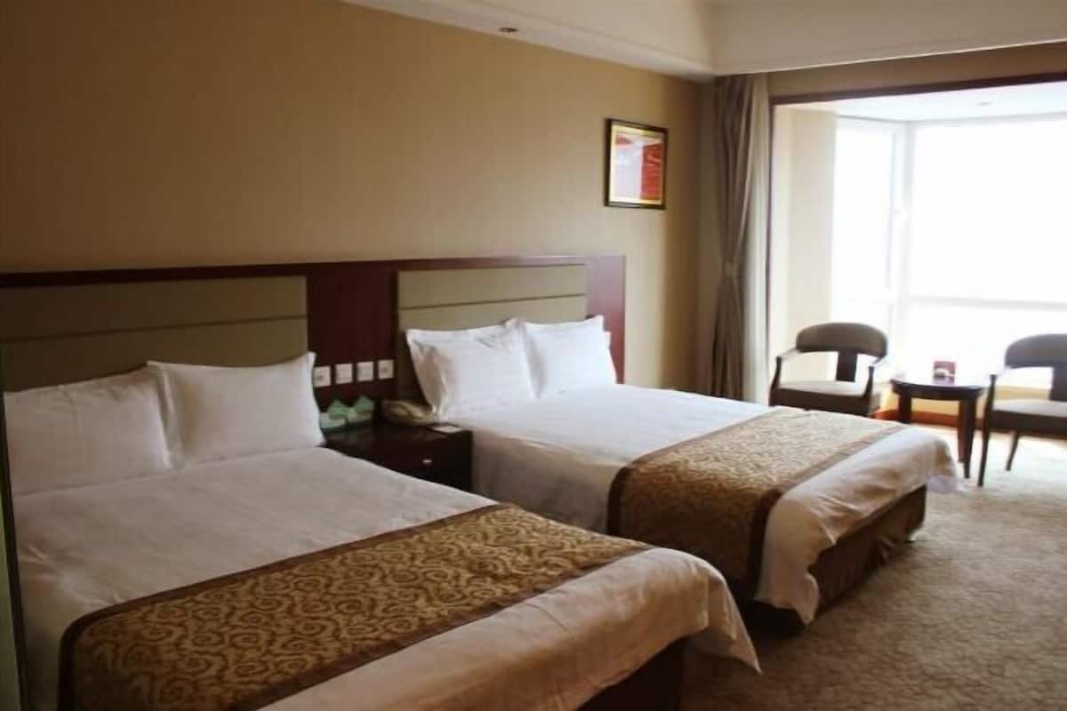 Minibar, desk, blackout curtains, iron/ironing board