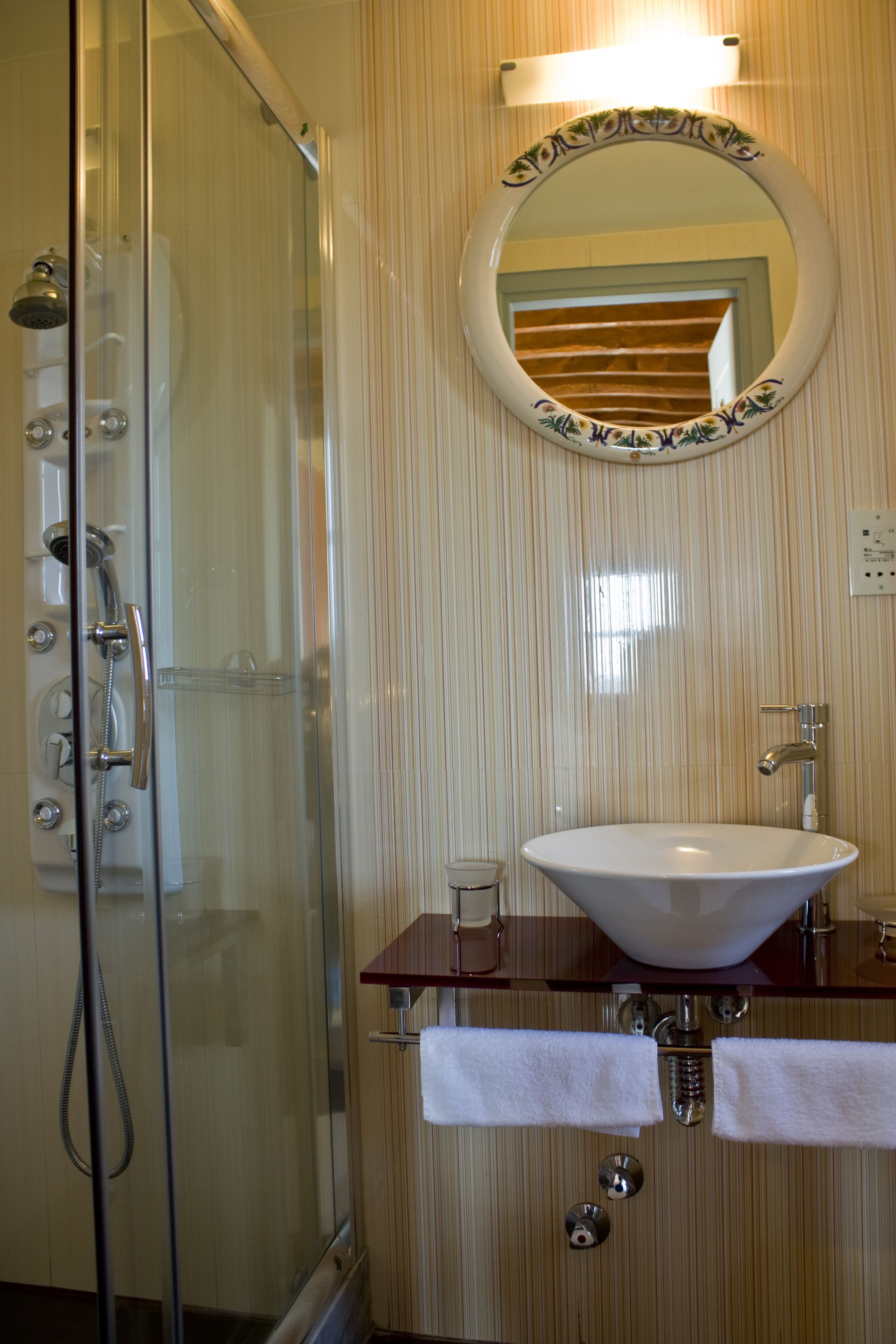 junior studio suite | bathroom | bathrobes, towels