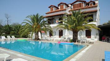 Outdoor pool, pool umbrellas, pool loungers