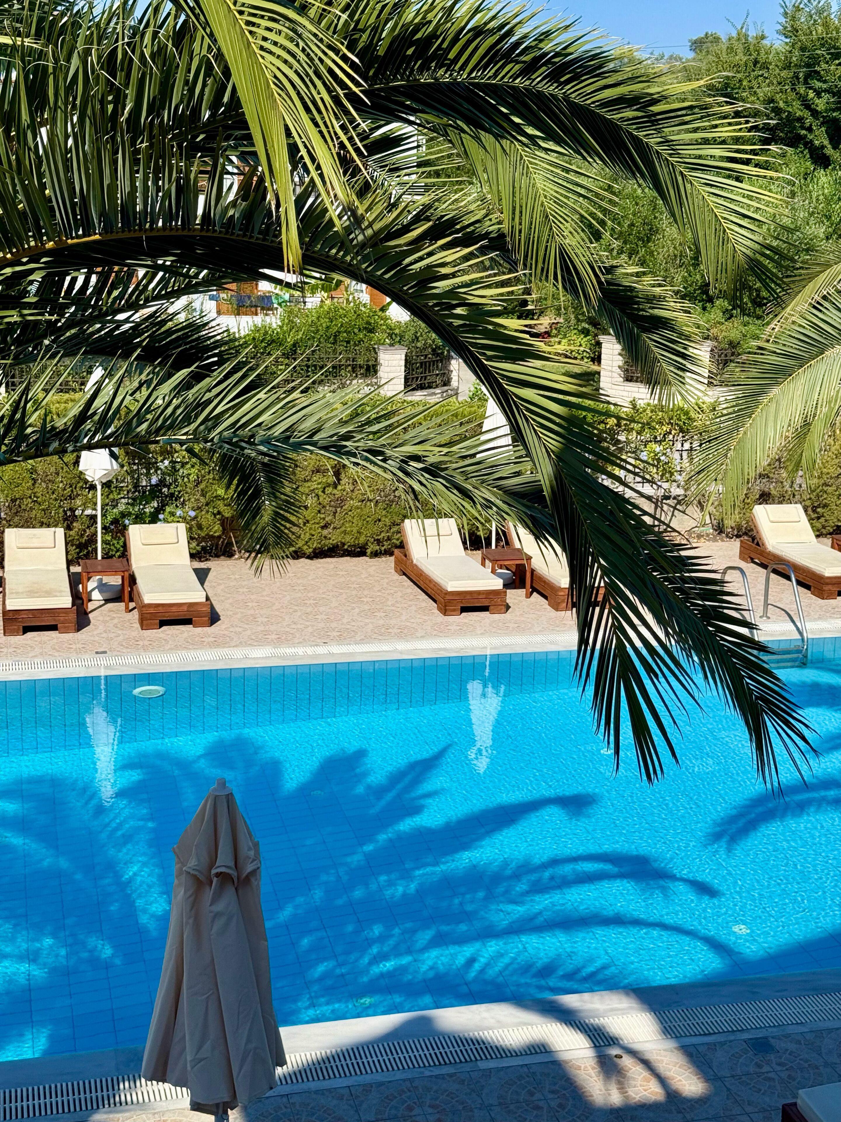 Studio, Pool View | Minibar, desk, blackout drapes, iron/ironing board