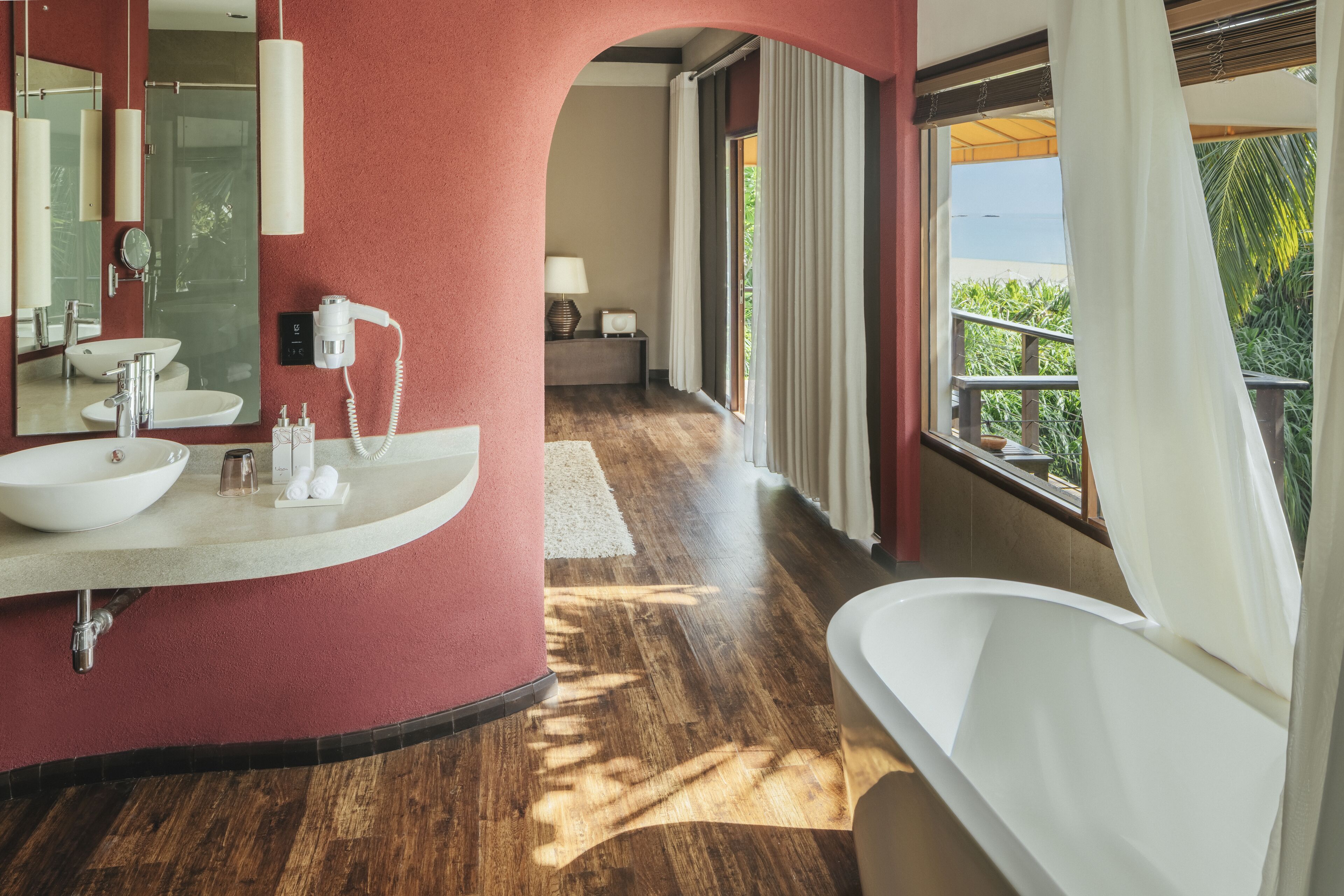 beach villa | bathroom | hydromassage showerhead, free toiletries, hair dryer, bathrobes
