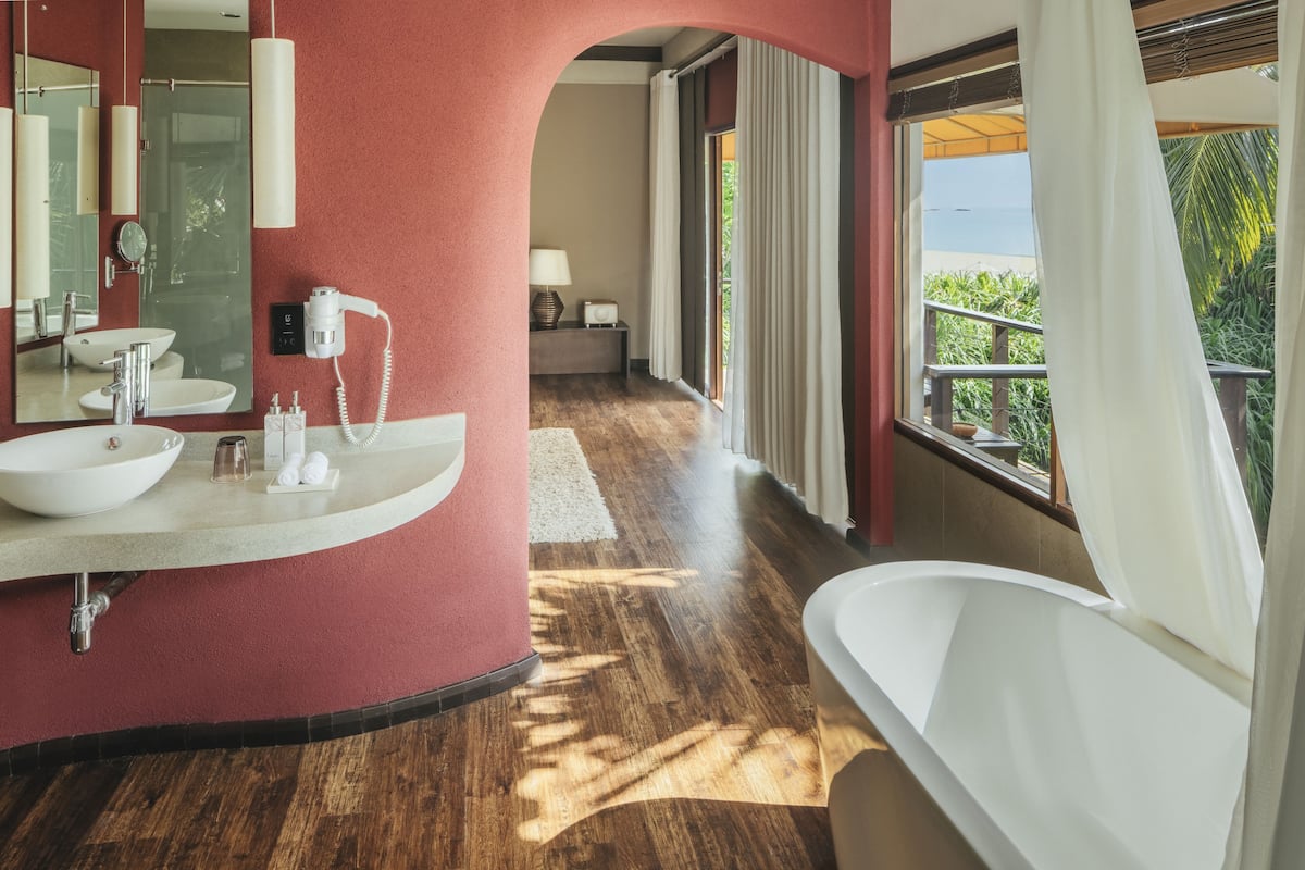 beach villa | bathroom | hydromassage showerhead, free toiletries, hair dryer, bathrobes