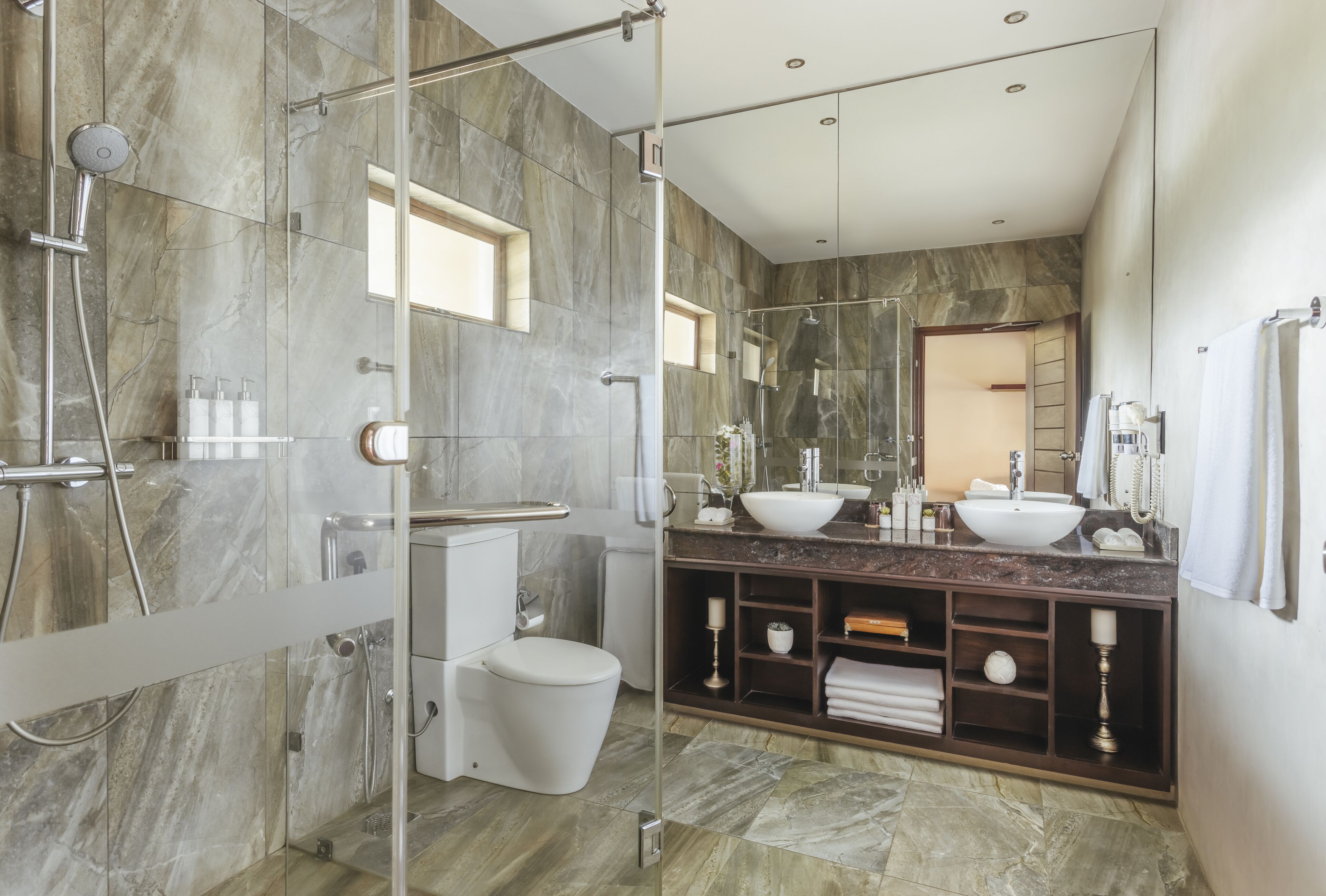 bay suite | bathroom | hydromassage showerhead, free toiletries, hair dryer, bathrobes