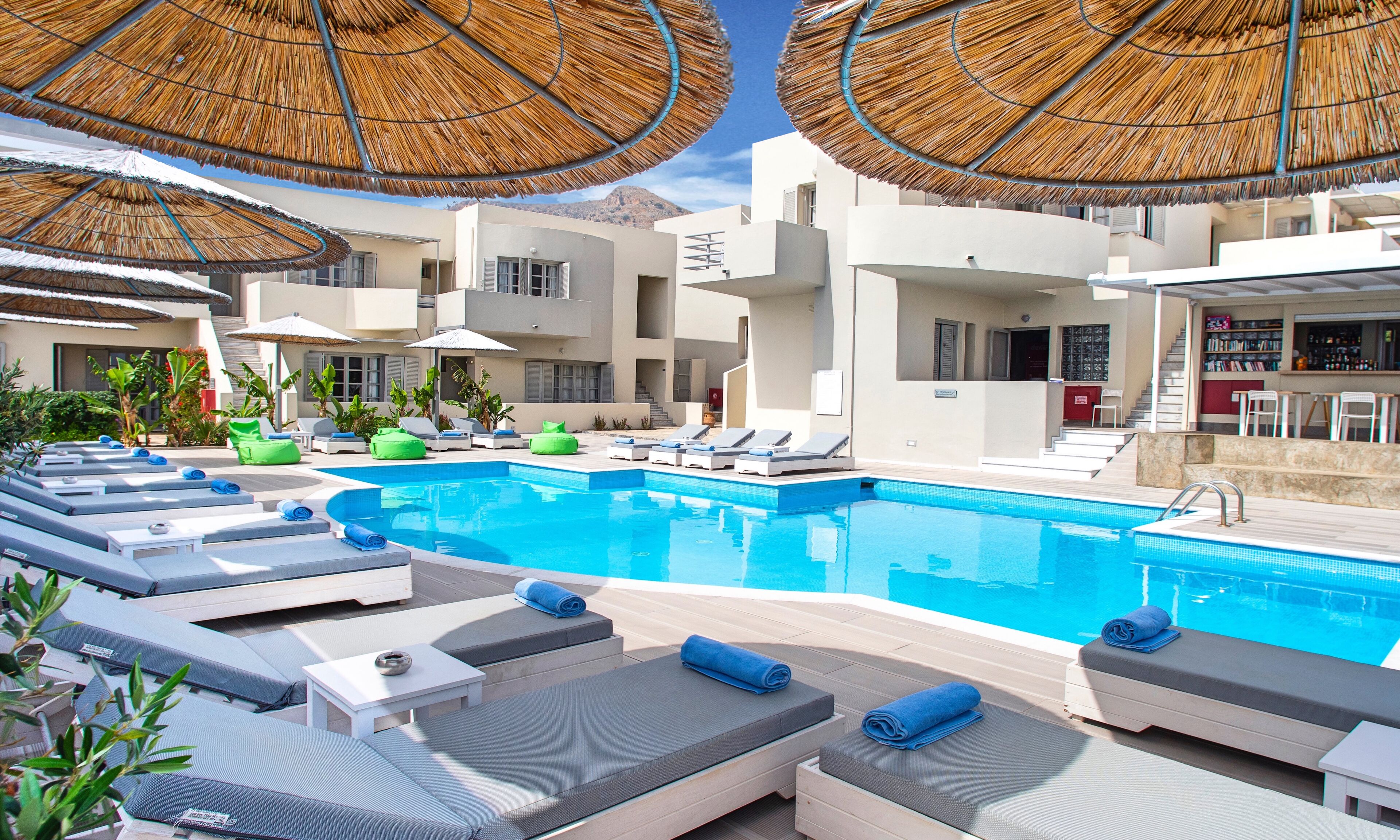 outdoor pool, pool umbrellas, pool loungers