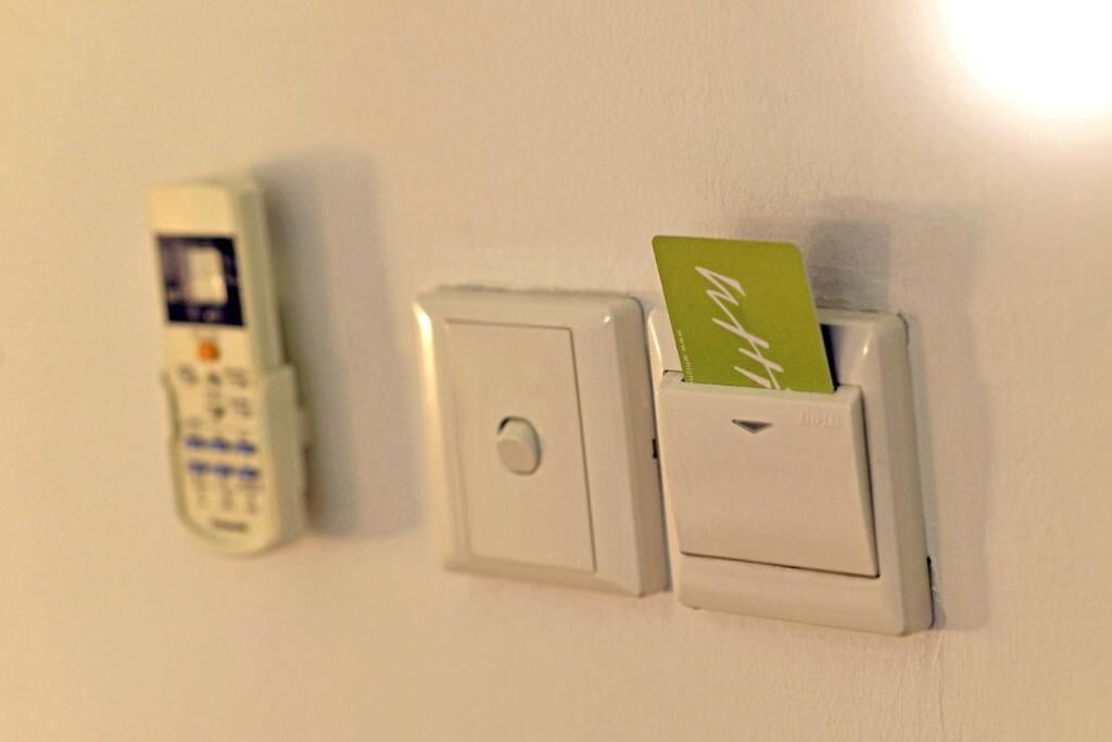 A wall-mounted intercom and card reader.