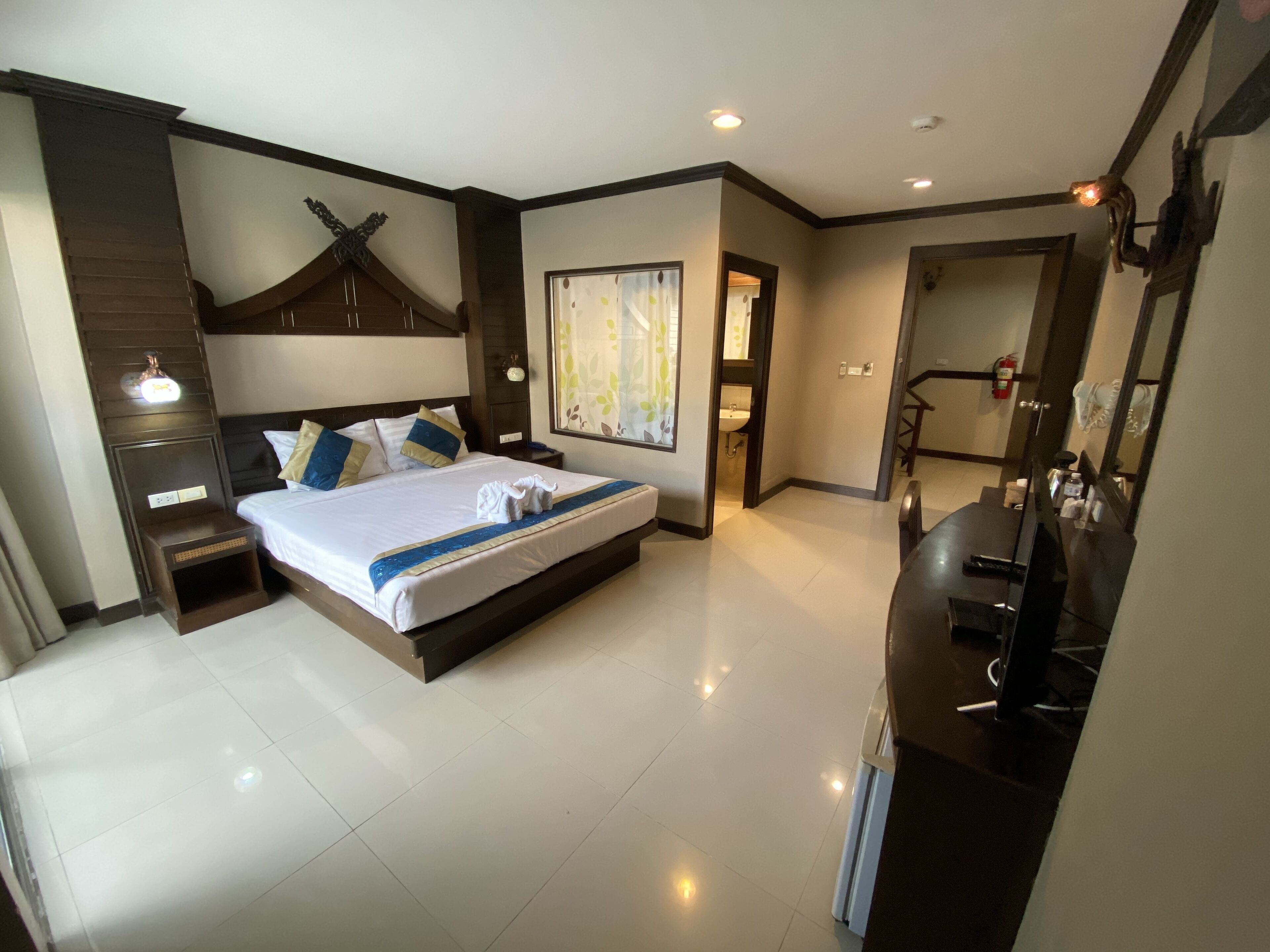 deluxe room | premium bedding, minibar, in-room safe, blackout curtains