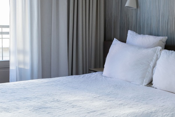 Premium bedding, down duvets, in-room safe, desk