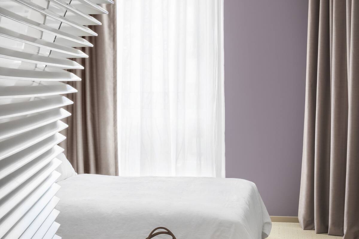 premium bedding, down duvets, in-room safe, desk