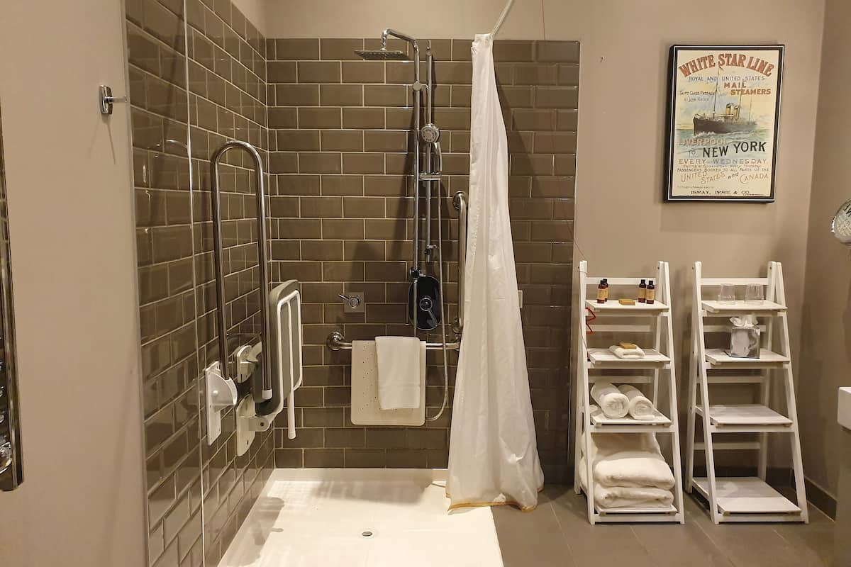 superior double room, accessible | bathroom | combined shower/bathtub, rainfall showerhead, designer toiletries