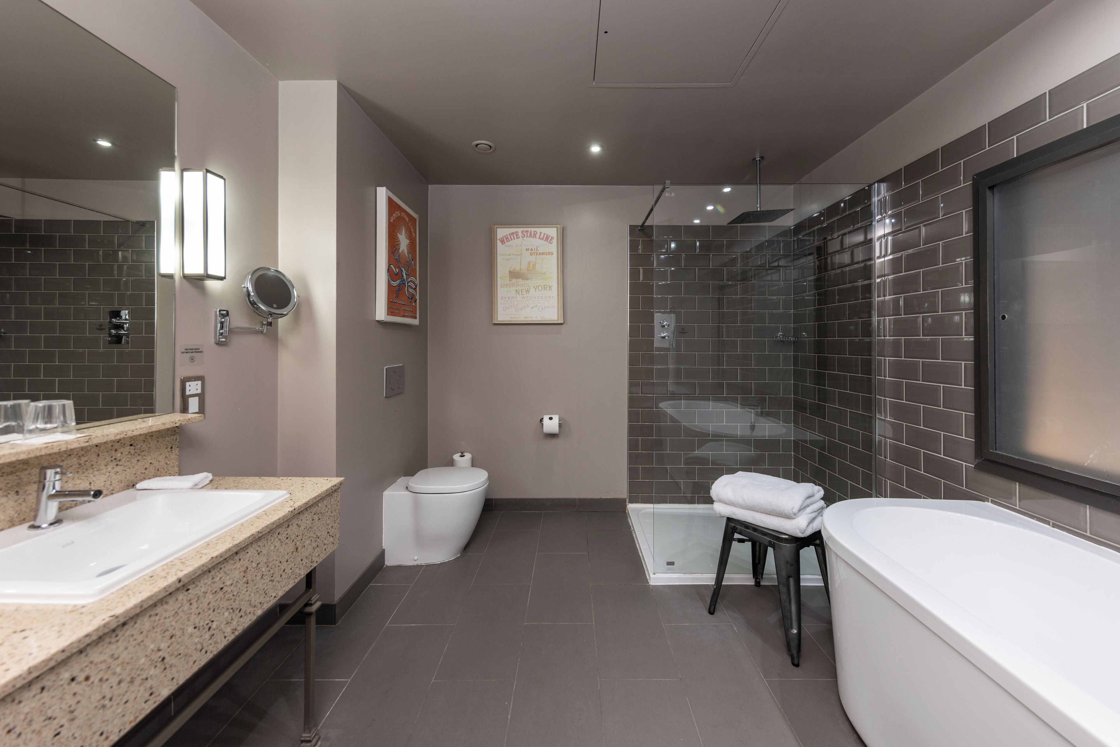 superior double room, dockside view | bathroom | combined shower/bathtub, rainfall showerhead, designer toiletries