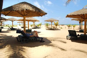 On the beach, sun-loungers, beach umbrellas, waterskiing - Goldi Sands Hotel (Negombo)