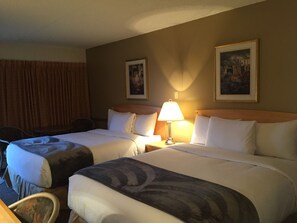 Deluxe Room, 2 Queen Beds | Living area | 32-inch TV with satellite channels - Eastglen Inn (Edmonton)