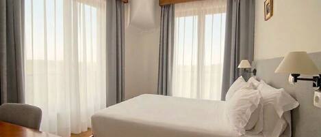 Premium tweepersoonskamer | Gratis wifi, beddengoed