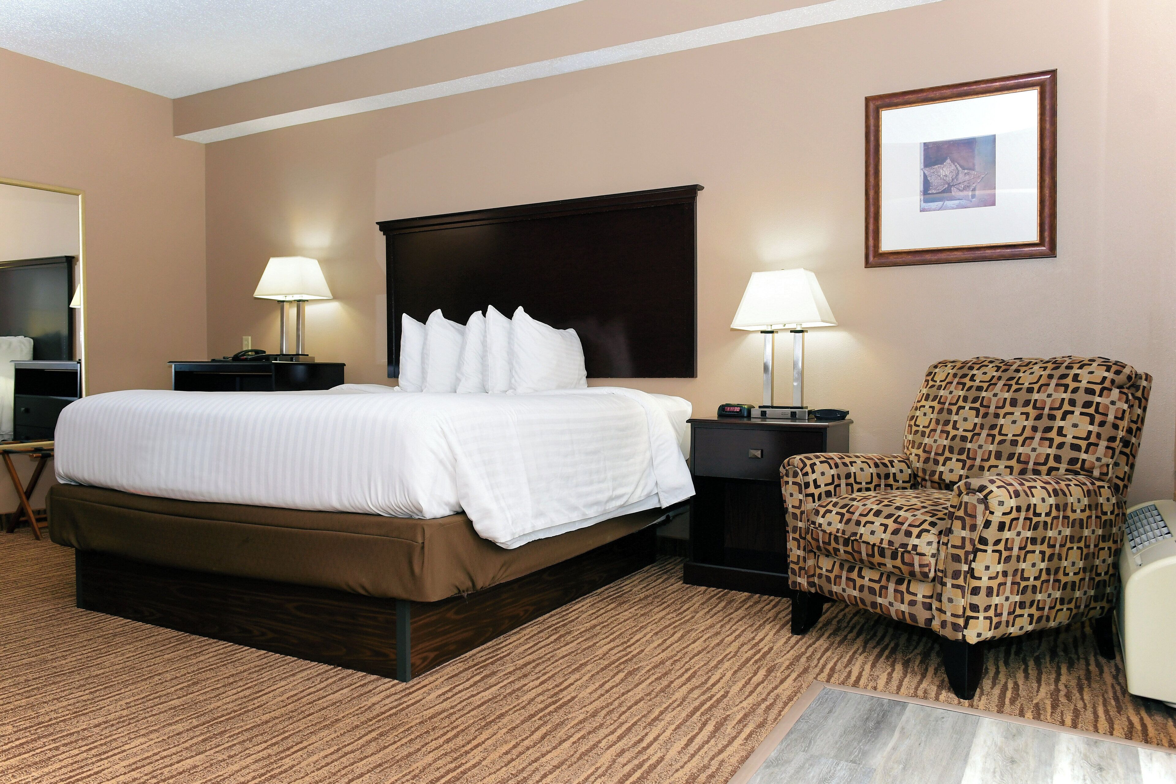 suite, 1 king bed with jacuzzi, non smoking | in-room safe, desk, laptop workspace, iron/ironing board