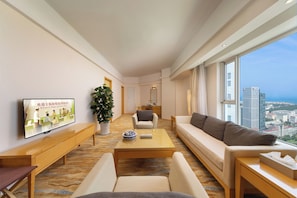 Deluxe Suite | Living room | LCD TV