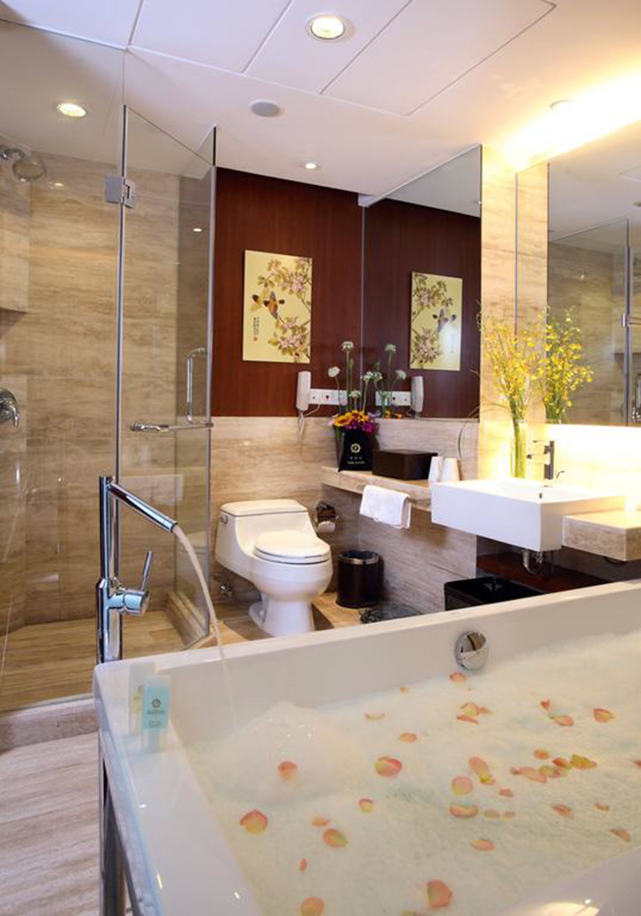 combined shower/bathtub, rainfall showerhead, designer toiletries