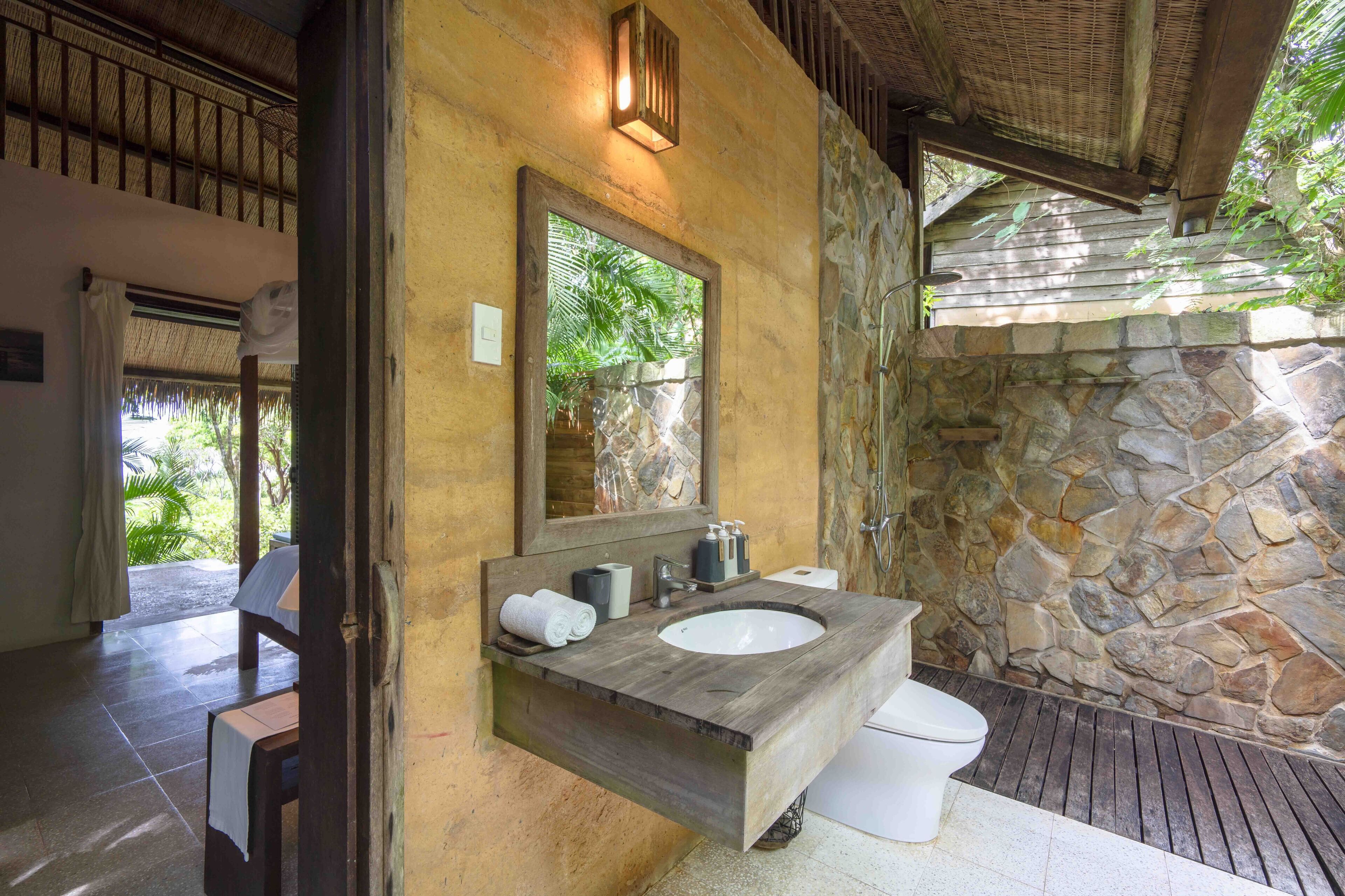 superior garden view rammed earth room | bathroom | shower, free toiletries, hair dryer, slippers