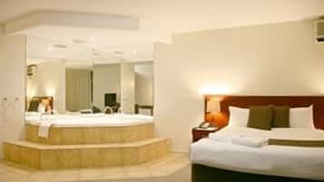 Luxury Spa Suite | Bathroom | Combined shower/tub, deep soaking tub, free toiletries, hair dryer