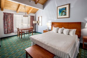 Desk, laptop workspace, blackout curtains, iron/ironing board