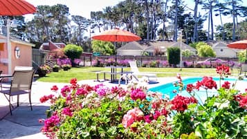 Outdoor pool, open 10:00 AM to 10:00 PM, sun loungers