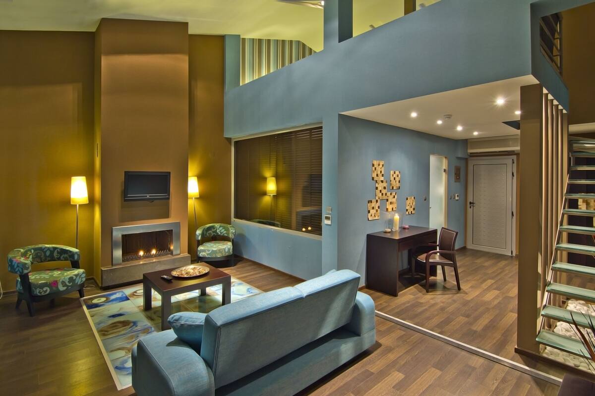 Villa | Minibar (free items), in-room safe, desk, blackout drapes