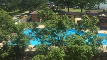 Seasonal outdoor pool, pool loungers