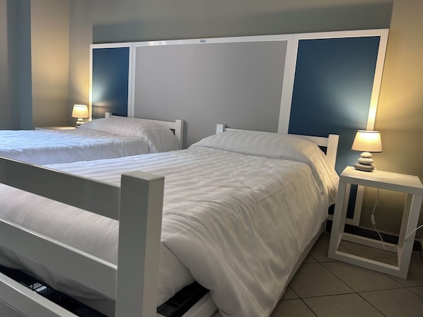 Double or Twin Room, Private Bathroom | Desk, blackout drapes, free WiFi, bed sheets